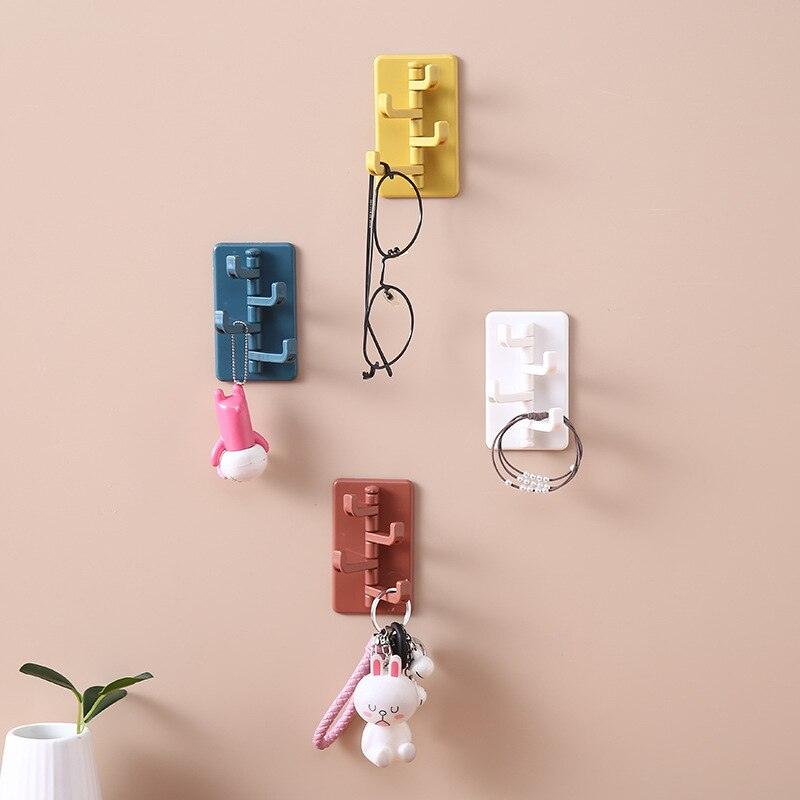 360° Rotating Adhesive Wall Hook                                            A space-saving rotating hook for organizing your bathroom, kitchen, bedroom, or entryway