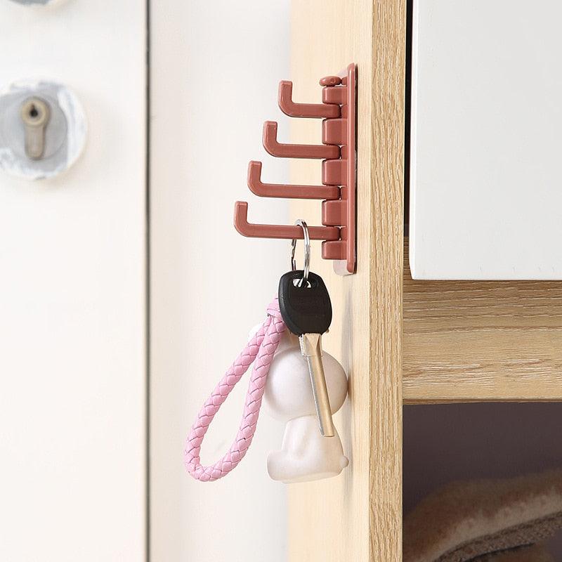 360° Rotating Adhesive Wall Hook                                            A space-saving rotating hook for organizing your bathroom, kitchen, bedroom, or entryway